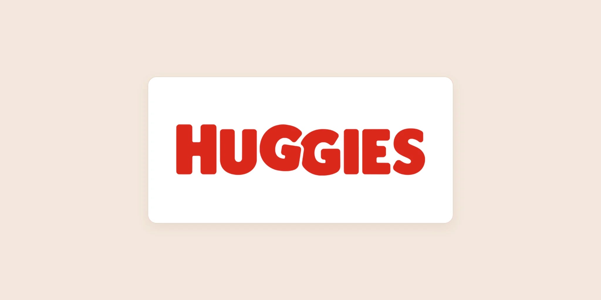 Huggies logo centered on a light warm background